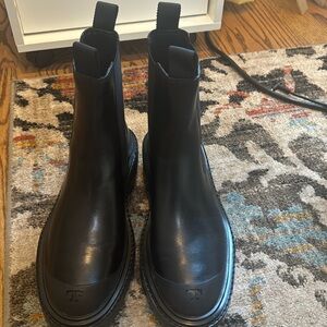 Black Tory Burch lug boots.